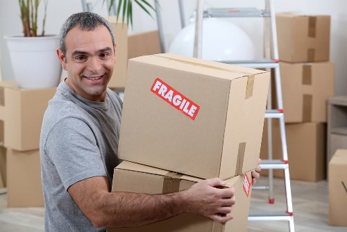 Removal van and moving boxes representing Romford house removals