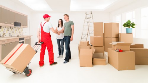 Staff checking booking notes for a man and van complaint