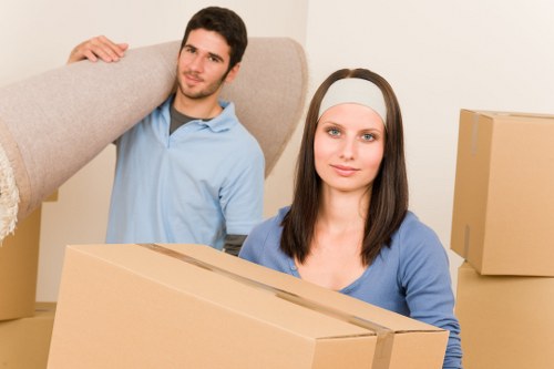 Local movers loading office items for a Romford relocation