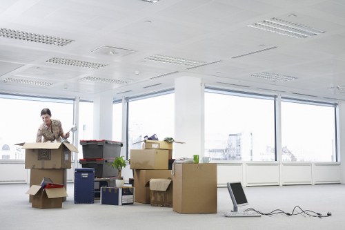 Packed boxes and furniture ready for transport during a Romford house move
