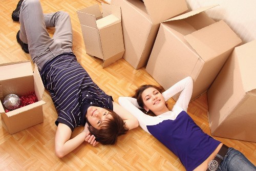 Local team removing sofas and beds from a Romford property